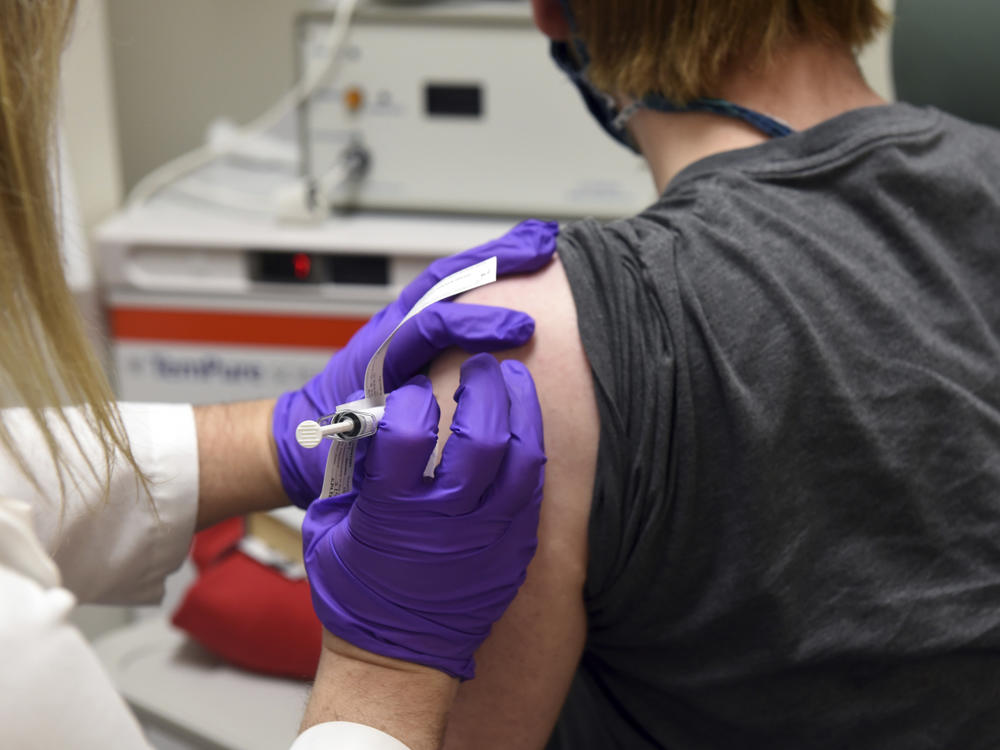 The first patient enrolled in Pfizer's COVID-19 vaccine clinical trial at the University of Maryland School of Medicine in Baltimore receives an injection in May.