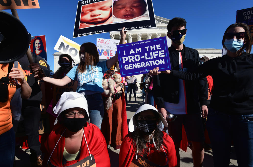 Demonstrators gather to take part in the nationwide Women's March.