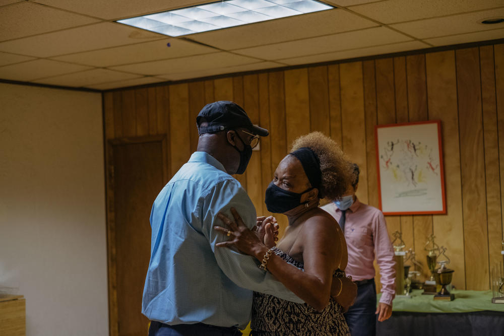 Ballroom dance instructor Richard Larocca leads a private dance lesson. For the first time in five months, Marc and Raymonde Elian attend an in-person dance class at the Arthur Murray Dance Studio in Yonkers, N.Y., in July 2020.