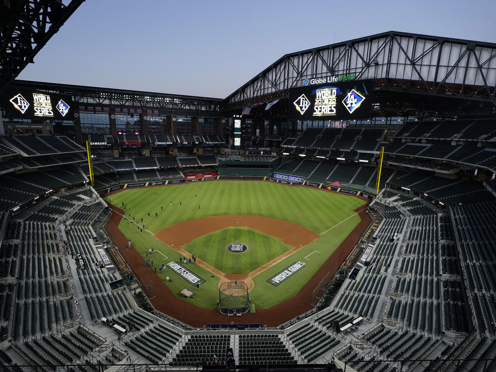 The Tampa Bay Rays practice at Globe Life Field with the roof open as the team prepares for Tuesday's World Series opener against the Los Angeles Dodgers, in Arlington, Texas. First pitch for Game 1 is at 8:09 p.m. ET.