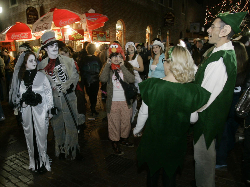 Goblins mix with elves in less scary times, celebrating Halloween in Salem, Mass., in 2007.