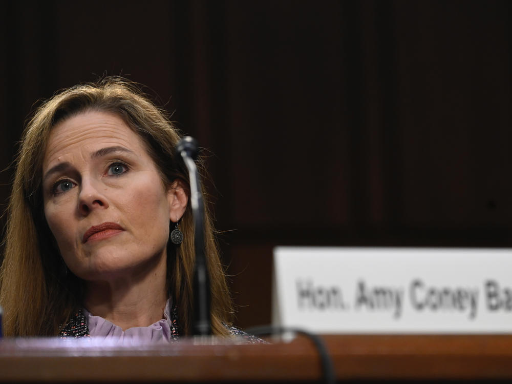 Supreme Court nominee Amy Coney Barrett testifies before the Senate Judiciary Committee on Oct. 14. On Thursday, the committee voted to advance her nomination to the full Senate for a confirmation vote.