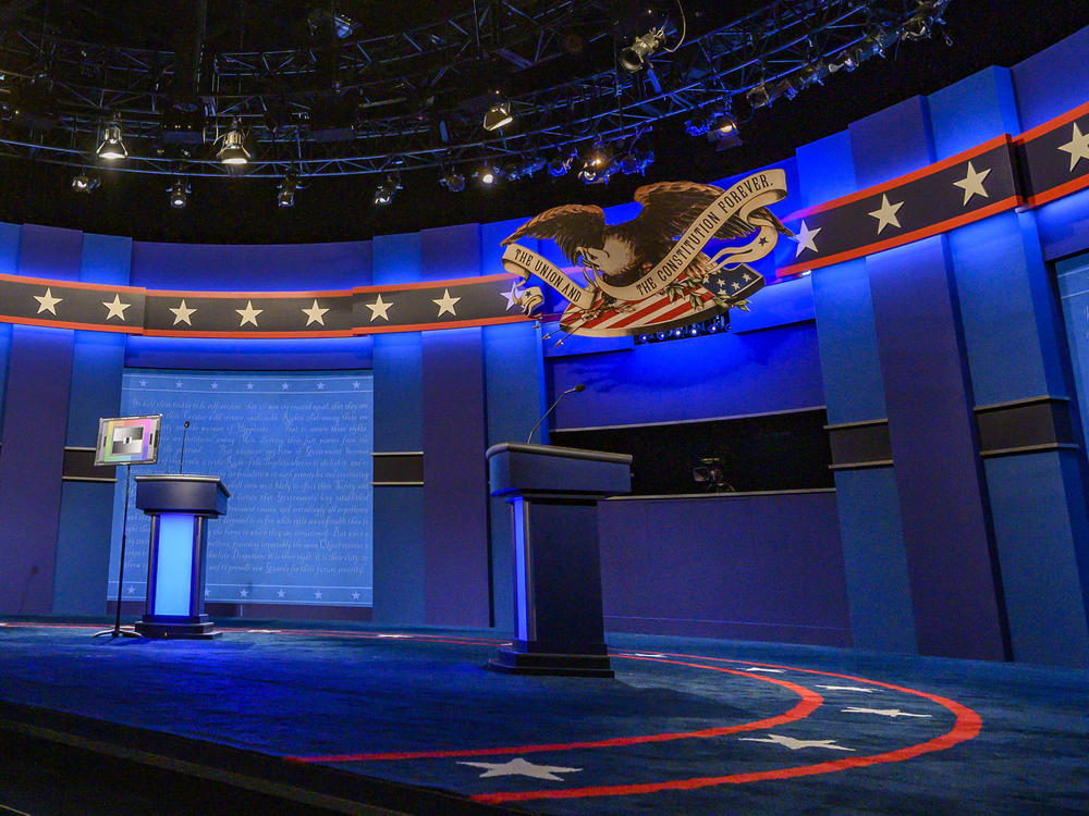 The stage for the final presidential debate of the 2020 election is tested for light and sound at Belmont University in Nashville, Tenn., on Wednesday.