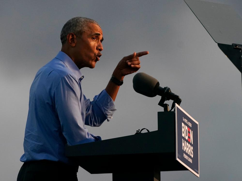 Former President Barack Obama addresses Joe Biden-Kamala Harris supporters during a drive-in rally Wednesday in Philadelphia.