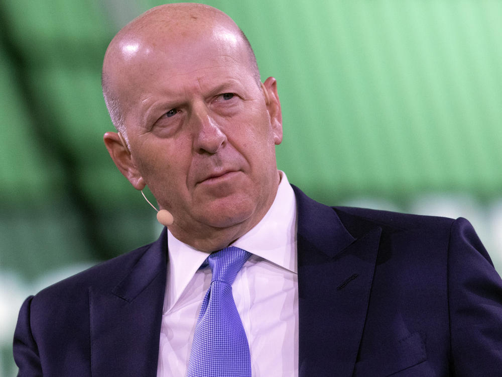 David Solomon, chairman and CEO of Goldman Sachs, shown here at a business roundtable in New York last year, is among several executives at the bank who will have to give back part of their pay.
