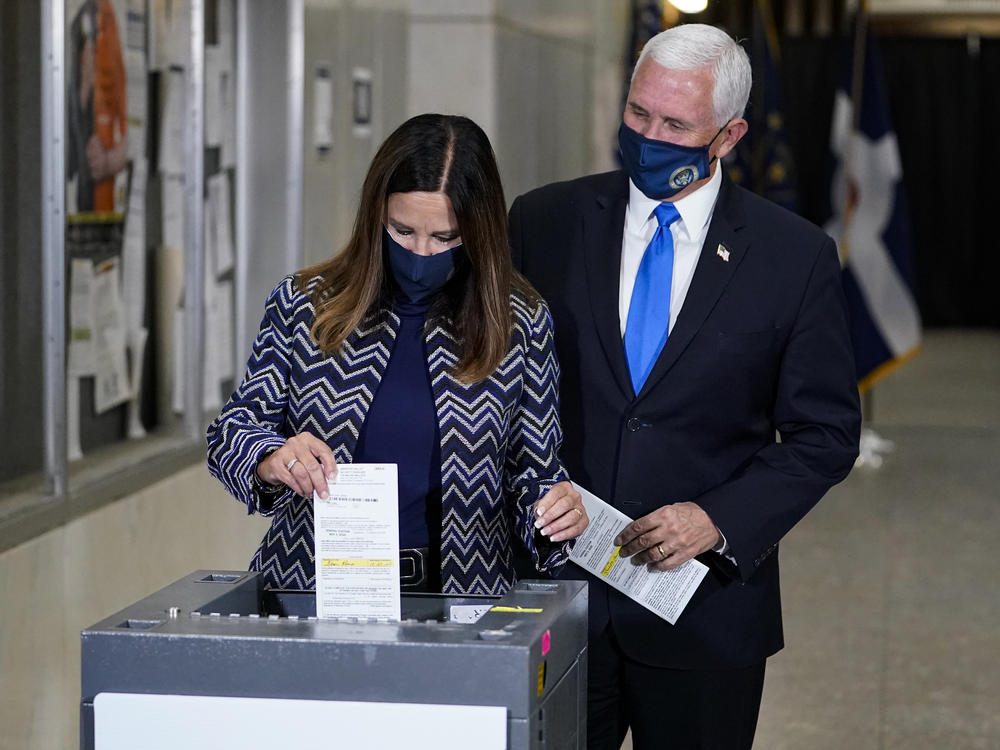 Vice President Pence and his wife, Karen, cast their ballots Friday during early voting in Indianapolis.