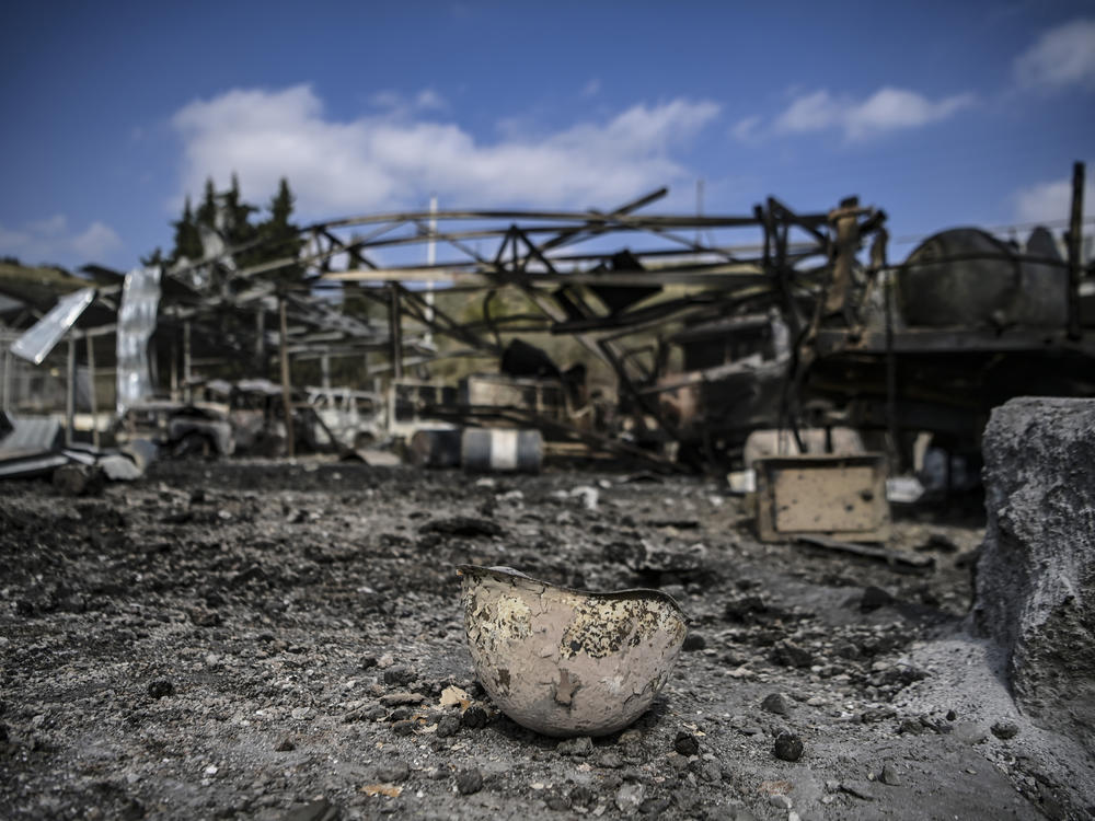 A burned helmet lying on the ground of the hospital in Martakert, a day after shelling during the ongoing fighting between Armenia and Azerbaijan over the disputed region of Nagorno-Karabakh.