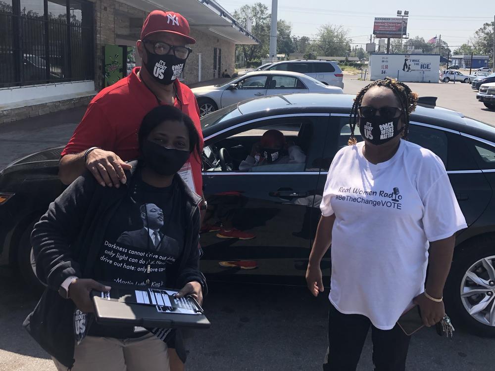 David Sims (left), Charlotte Nelson and Phyllis Hale-Benjamin go out canvassing in Pensacola for Real Women Radio.