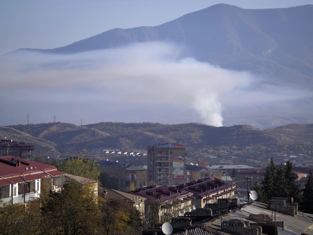 Smoke rises after shelling by Azerbaijan's artillery in Stepanakert, Nagorno-Karabakh, on Saturday.