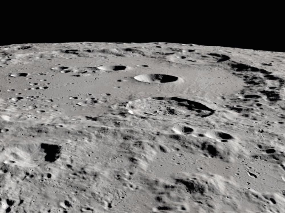 Researchers have detected water molecules in Clavius crater, in the moon's southern hemisphere. The large crater is visible from Earth.