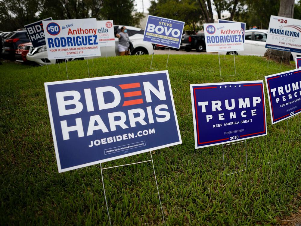 Campaign signs are in abundance last week for early voting at Westchester Regional Library in Miami.