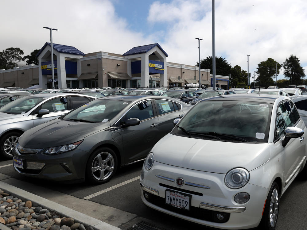 Used vehicles are parked on the sales lot at a CarMax store on Sept. 24 in Colma, Calif. CarMax reported a surge in earnings after used-car prices climbed steadily — and surprisingly — for months.