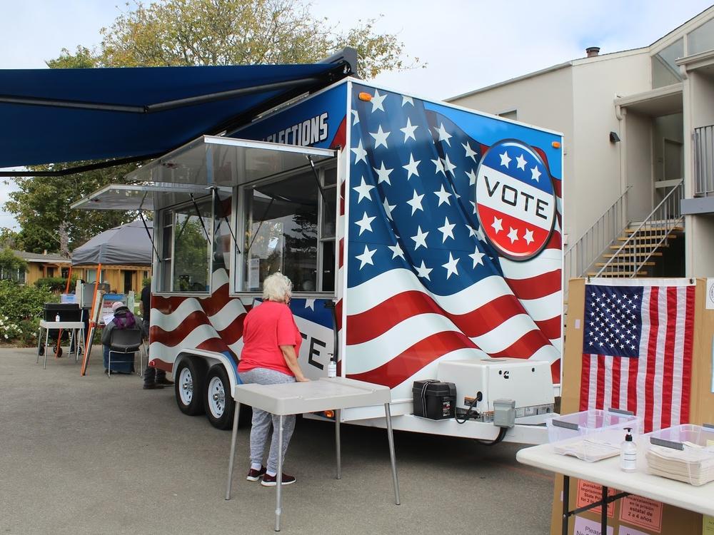 A new mobile voting center brings voting directly to residents in Santa Cruz County, Calif. Here, the VoteMobile is parked at Garfield Park Village, an apartment complex for seniors.