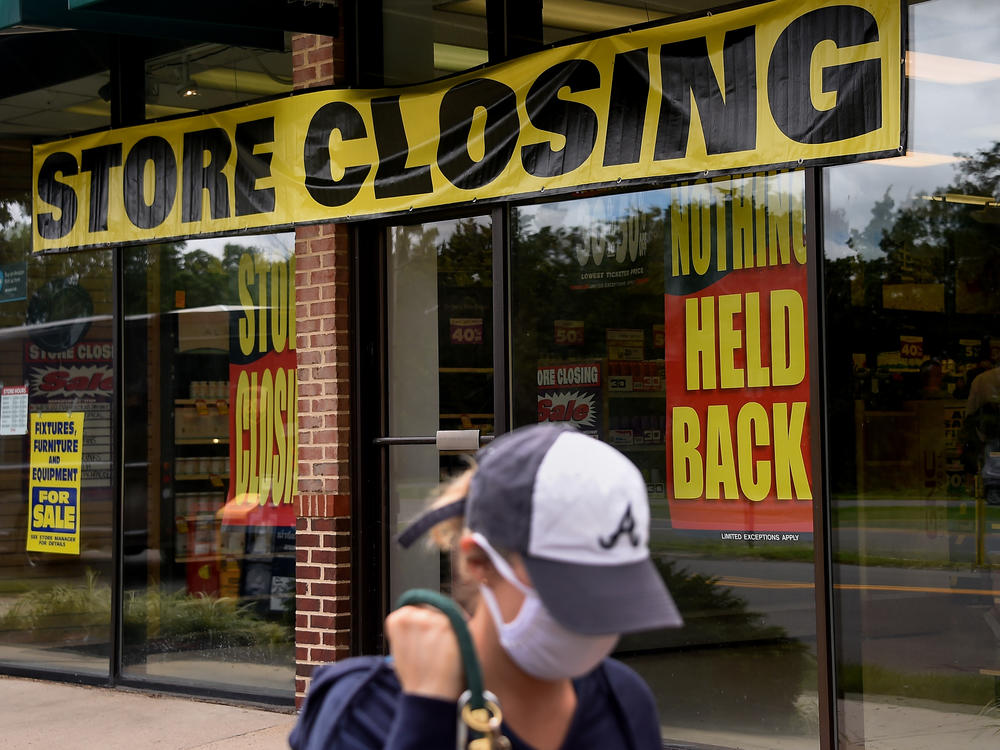 A store displays a sign before closing down permanently following the impact of the coronavirus pandemic, on Aug. 4, 2020 in Arlington, Va. The Small Business Administration's inspector general office said billions of dollars in relief loans may have been handed out to fraudsters or ineligible applicants.