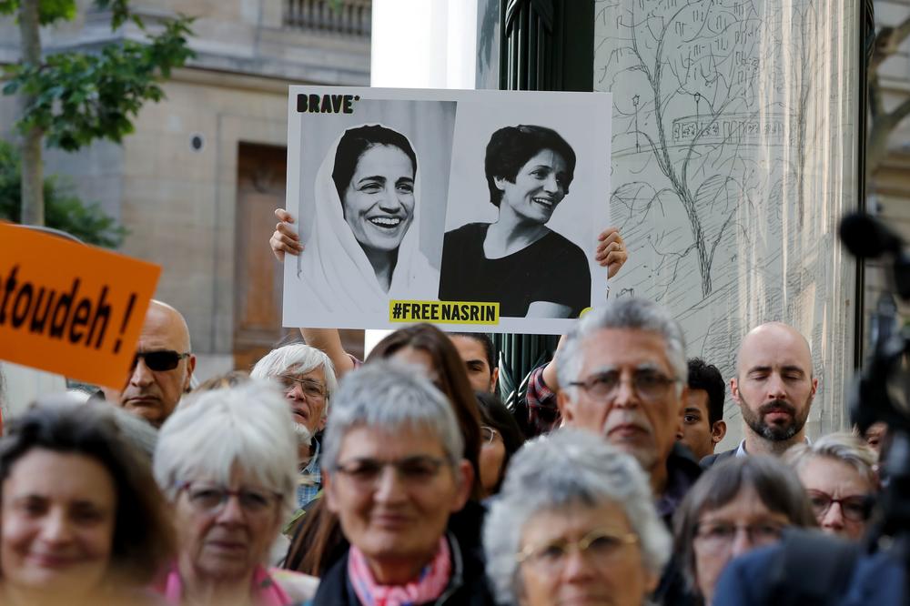 People gather outside the Iranian embassy in France on June 13, 2019, to demand the release of imprisoned Iranian human rights lawyer Nasrin Sotoudeh. 