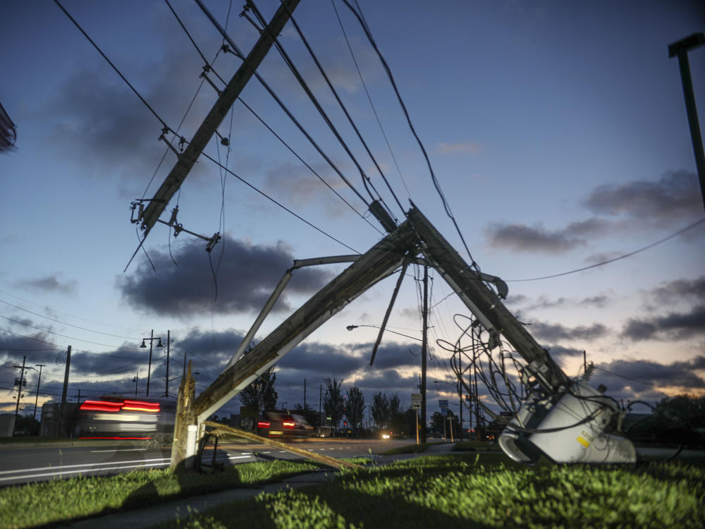 Downed power lines and other damage from Hurricane Zeta are seen in Chalmette, La., on Thursday. Seven hurricanes have hit the Gulf Coast in 2020, bringing extensive destruction to the area.