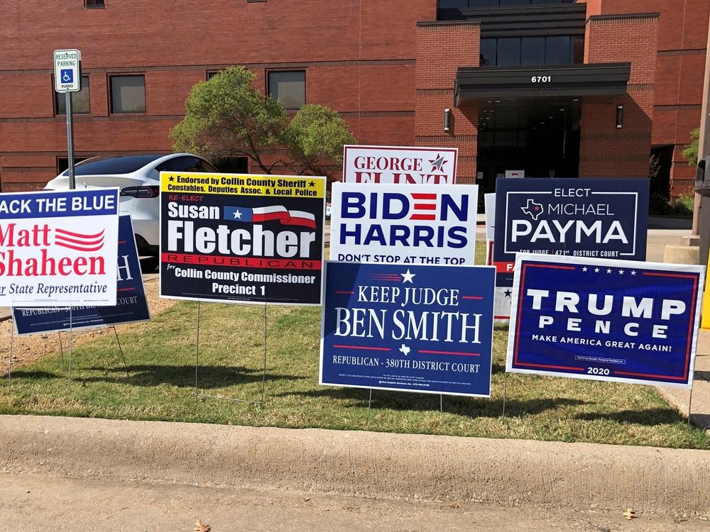 Election signs are seen outside a polling station this month in Plano, Texas.