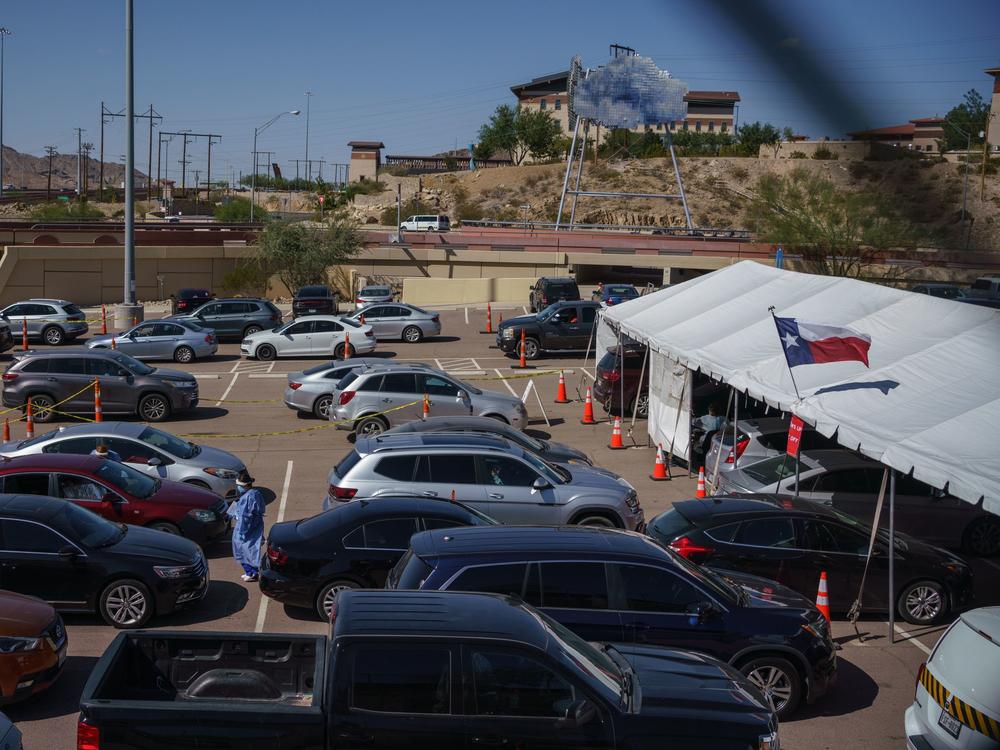 Cars line up for coronavirus tests at the University of Texas at El Paso on Oct. 23. The city has seen a surge in cases, prompting a judge to issue a shutdown of nonessential businesses.