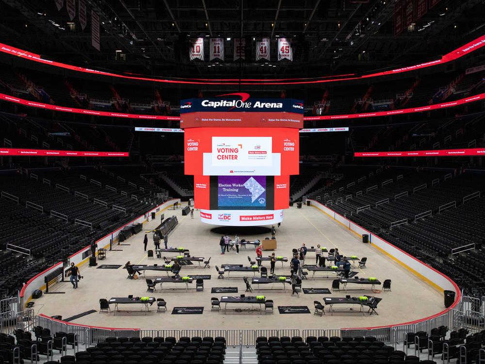 Voting trainers prepare to instruct poll workers in preparation for early voting at Capital One Arena in Washington, D.C., on Oct. 19.