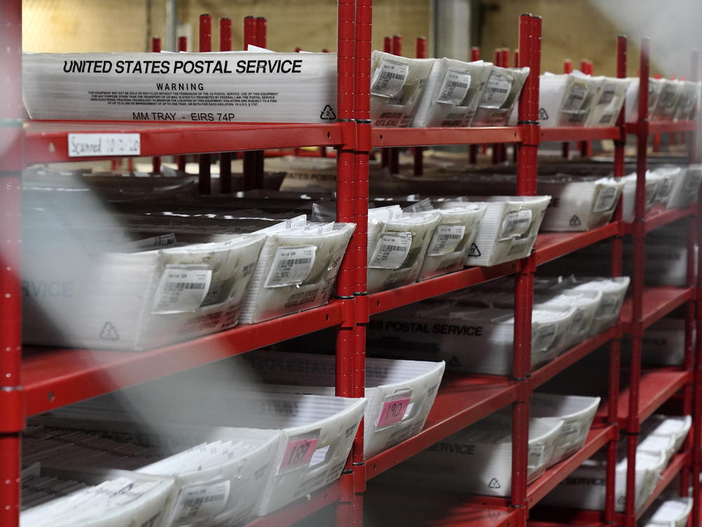 The U.S. Postal Service says it has processed and delivered 122 million mail-in ballots.