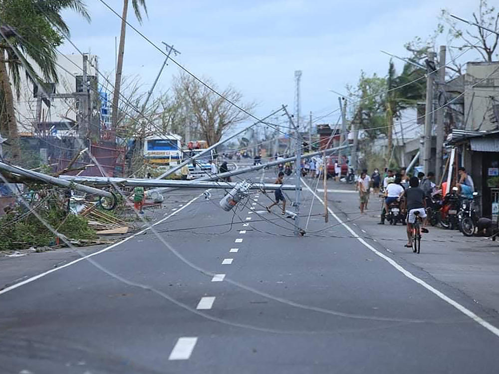 Typhoon Goni downed electric posts in Tabaco, Albay province, in addition to causing deadly flooding and storm surge when it struck the Philippines on Sunday.