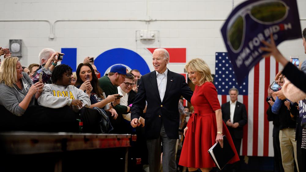Biden and his wife, Jill, arrive at a town hall event in Des Moines, Iowa, on Feb. 2. Biden would finish a disappointing fourth in the Iowa caucuses.