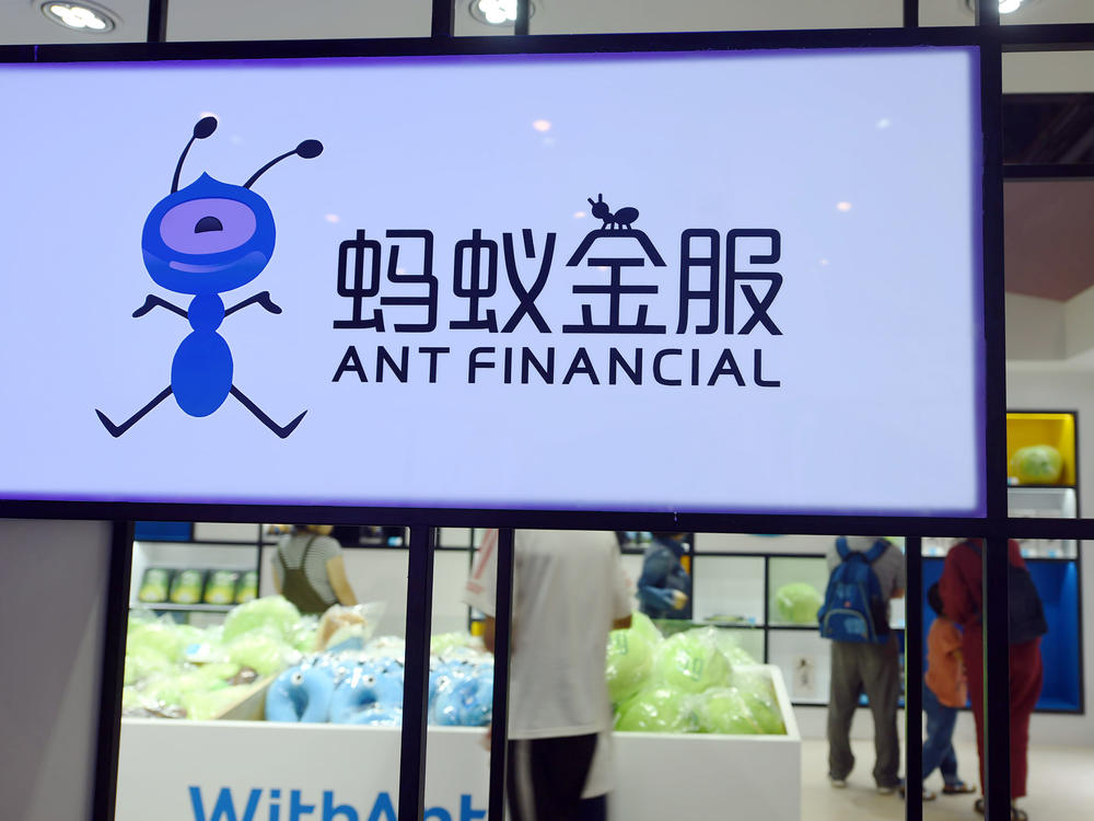People visit a showroom of the mobile payment powerhouse, Ant Financial, in China in 2018. Ant Financial, a spinoff from the Alibaba Group, was set to raise $37 billion in an IPO that regulators abruptly halted.