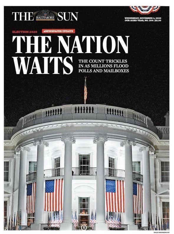 The front page of Wednesday's <em>Baltimore Sun</em> captured a mood: the White House illuminated against a dark sky as 