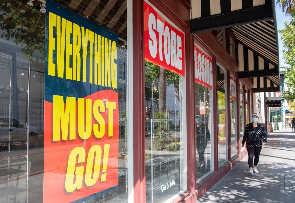 Store closing signs are posted at a Sur La Table kitchenware store on Sept. 22 in Los Angeles. Thousands of retail stores across the country have closed during the pandemic.