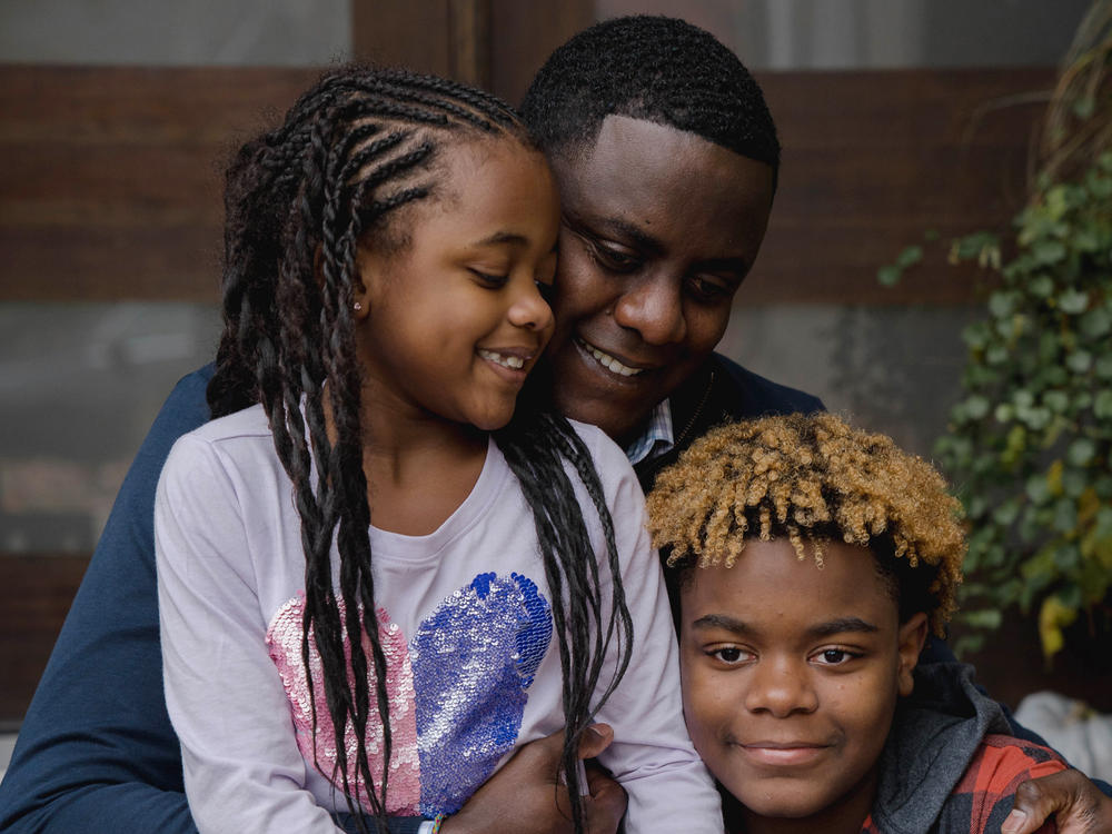 Station with his children, Taylor (left) and Jaden.