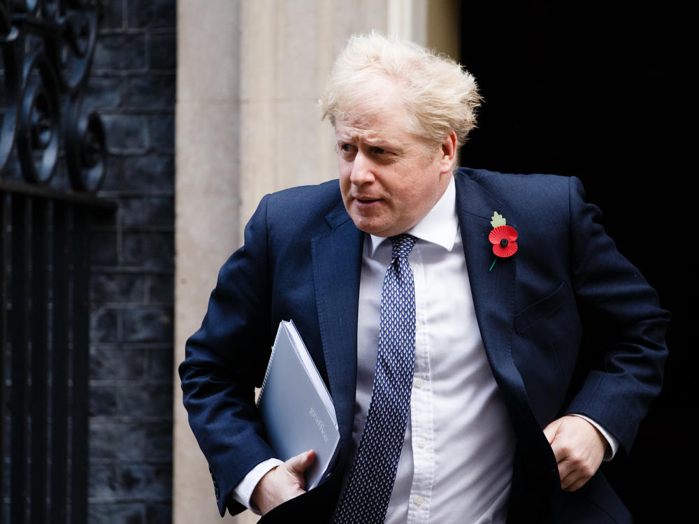 British Prime Minister Boris Johnson leaves 10 Downing Street for the weekly cabinet meeting in London on Tuesday.