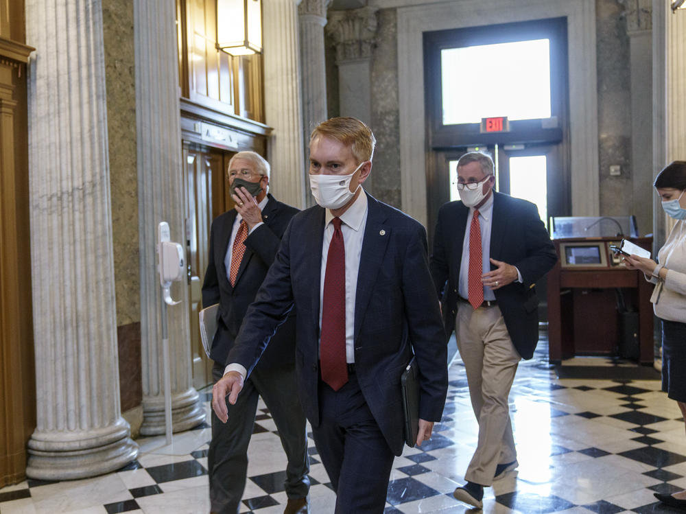 Sen. James Lankford, R-Okla., center, is among the Republican lawmakers supporting a push for President-elect Joe Biden to receive new intelligence briefings as part of his transition to the White House.