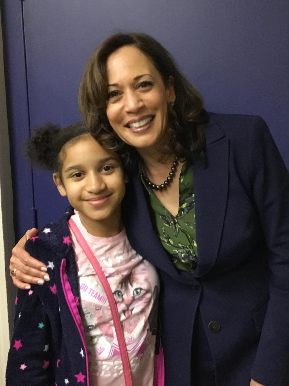 Harris poses with Jasmeen Coronado, then age 9, at a campaign event in Hemingway, S.C., last year.