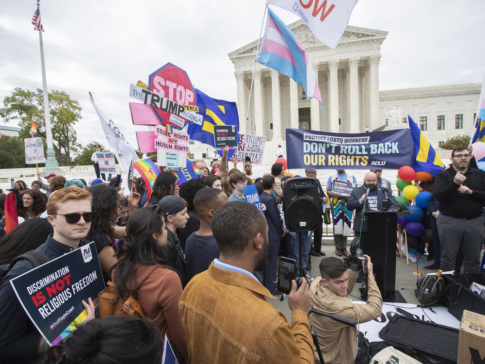 LGBTQ supporters gather in front of the U.S. Supreme Court on Oct. 8, 2019.