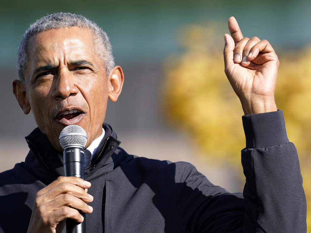 Former President Barack Obama speaks at a rally for Joe Biden in Flint, Mich. on Oct. 31. In an interview with NPR, Obama said Trump was 
