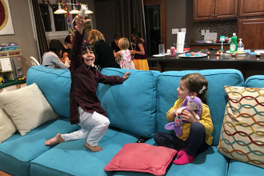 Sarita Talusani Keller's son, Jackson, is seen celebrating their annual Diwali potluck in October, 2019.