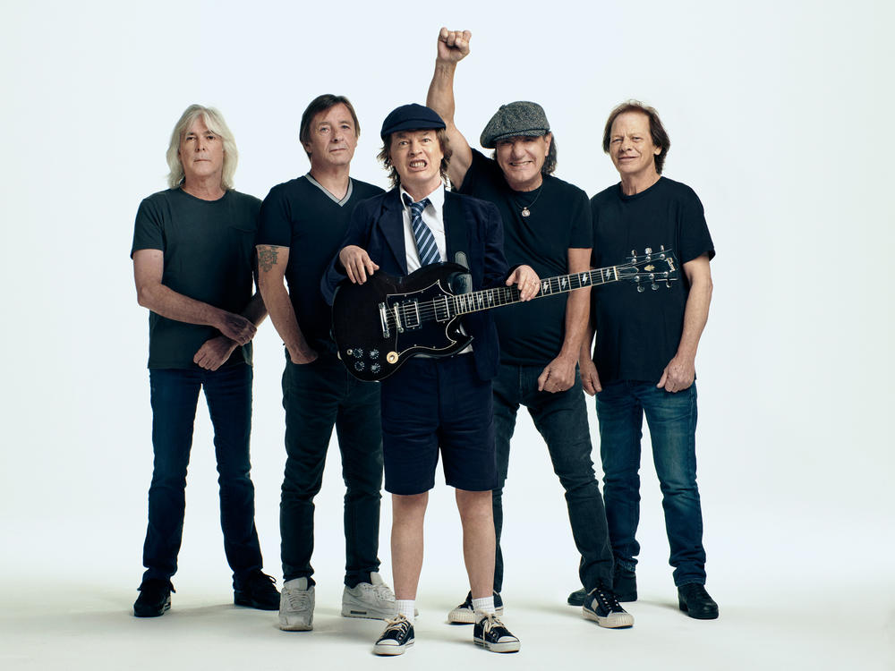 AC/DC, left to right: Cliff Williams, Phil Rudd, Angus Young, Brian Johnson, Stevie Young.