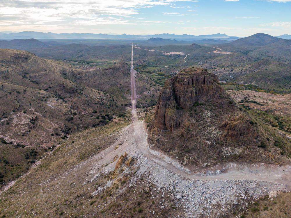 In the Guadalupe Canyon in southeastern Arizona, work crews are dynamiting mountainsides and bulldozing access roads in this stunning landscape to make way for the border wall. Mexico is on the left.