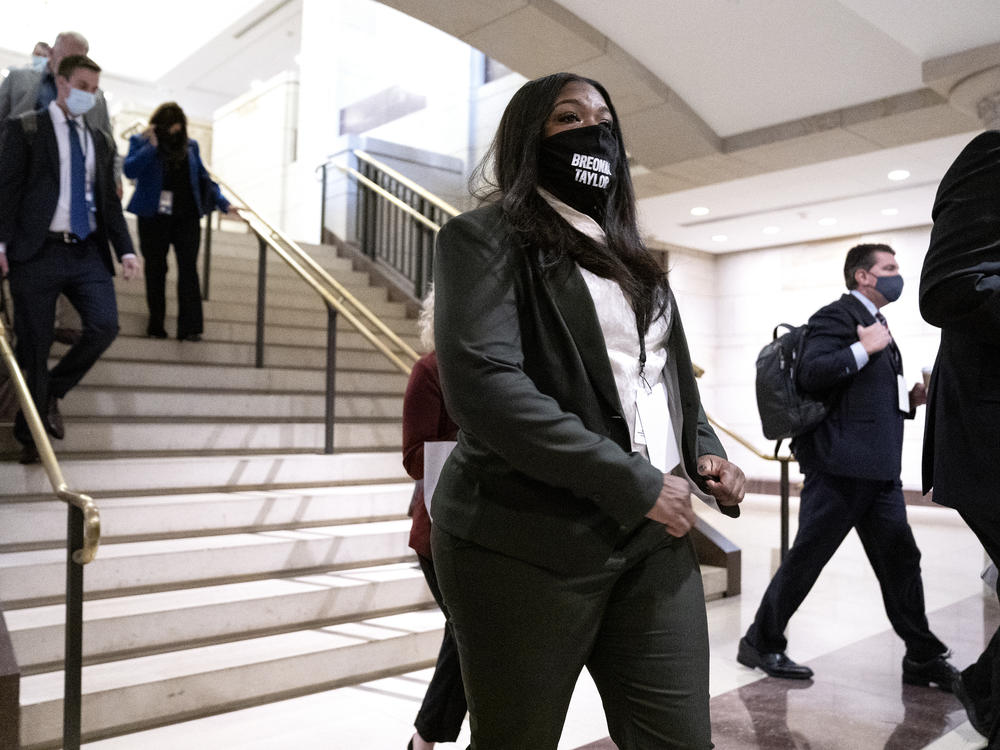 Rep.-elect Cori Bush, a Democrat from Missouri, arrives at a new member briefing at the Capitol on Friday. With the pandemic raging, the orientation bore little resemblance to previous sessions. But lawmakers will have access to coronavirus testing.
