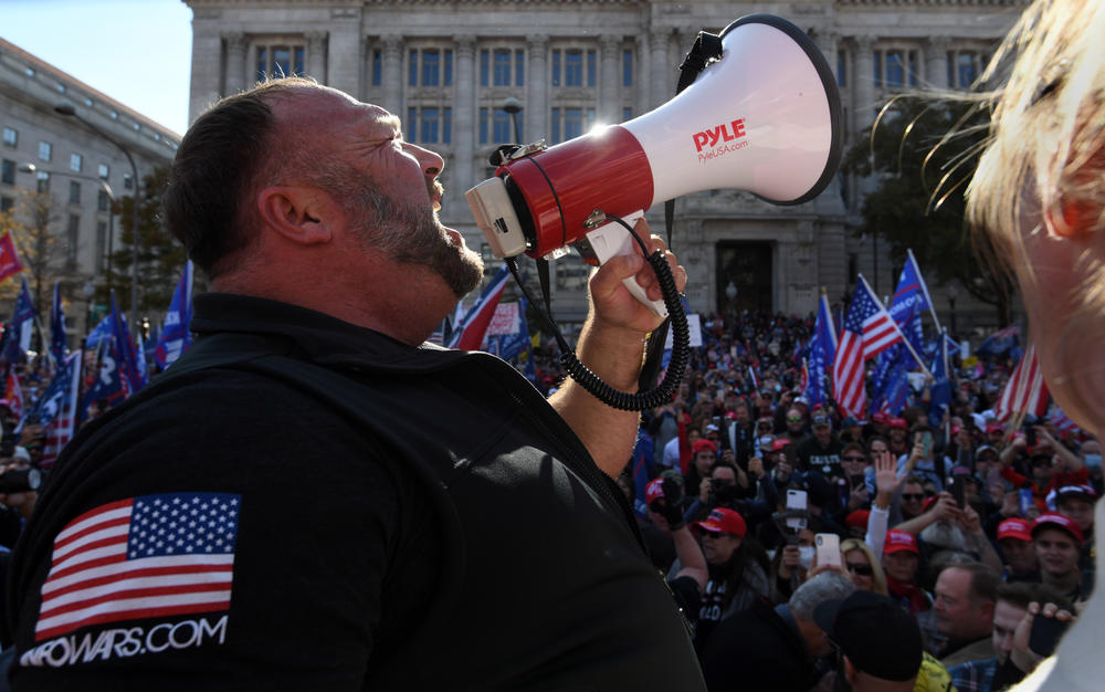 Far-right media personality and conspiracy theorist Alex Jones, of the website InfoWars, and Trump supporters rally in Washington, D.C.