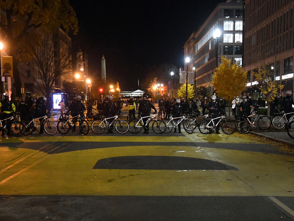 Opposing views clash in Black Lives Matter Plaza after supporters of Trump held a rally.