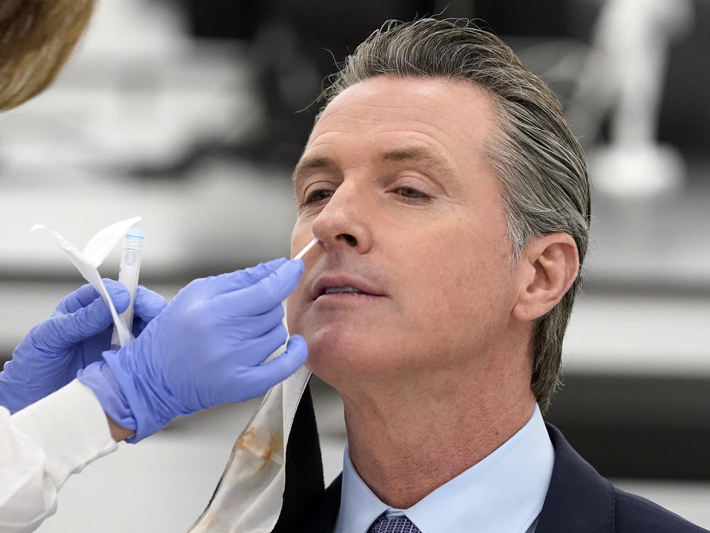 California Gov. Gavin Newsom, pictured receiving a coronavirus test on Oct. 30, apologized to residents on Monday for attending a birthday party with too many guests. 