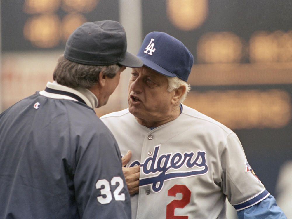 LA Dodgers manager Tommy Lasorda argues a call with an umpire during a game against the New York Mets in 1992. During his two decades as manager, Lasorda led Los Angeles to two World Series championships.