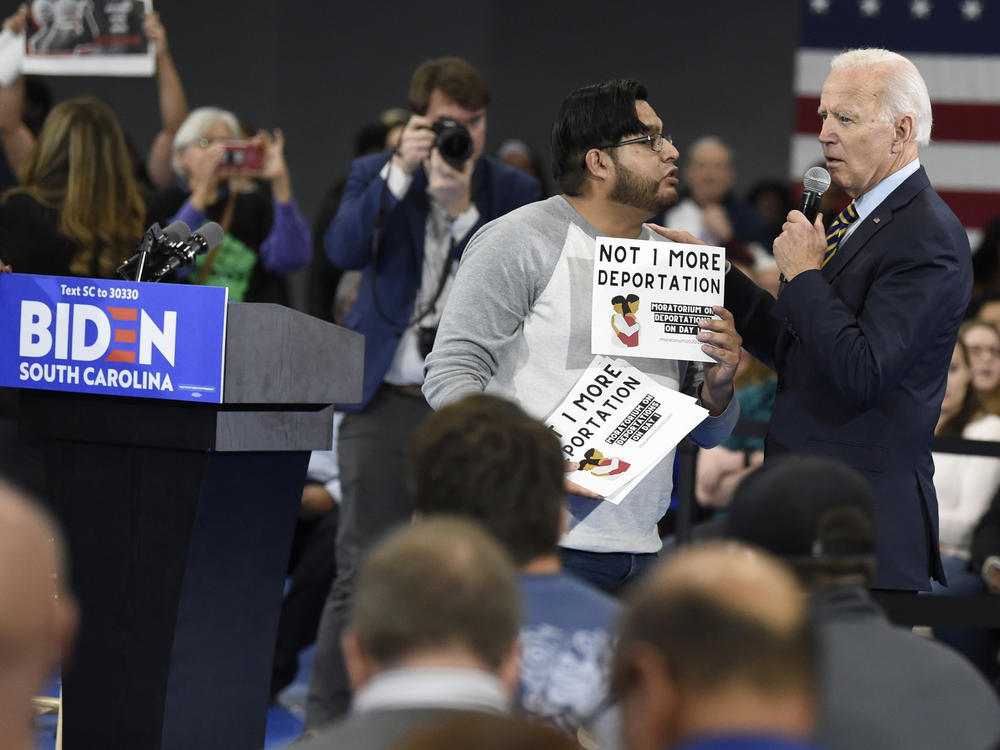 While campaigning in November 2019, Joe Biden talked with a protester about his stance on deportations at a town hall at Lander University in Greenwood, S.C. The Biden administration says it will rein in Immigration and Customs Enforcement, starting with a temporary moratorium on deportations.
