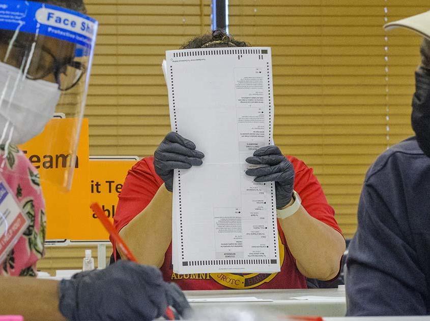 Fourteen auditors began the manual recount of around 71,000 presidential ballots in Macon, Ga., on Friday, part of a statewide recount of about 5 million votes cast across Georgia.