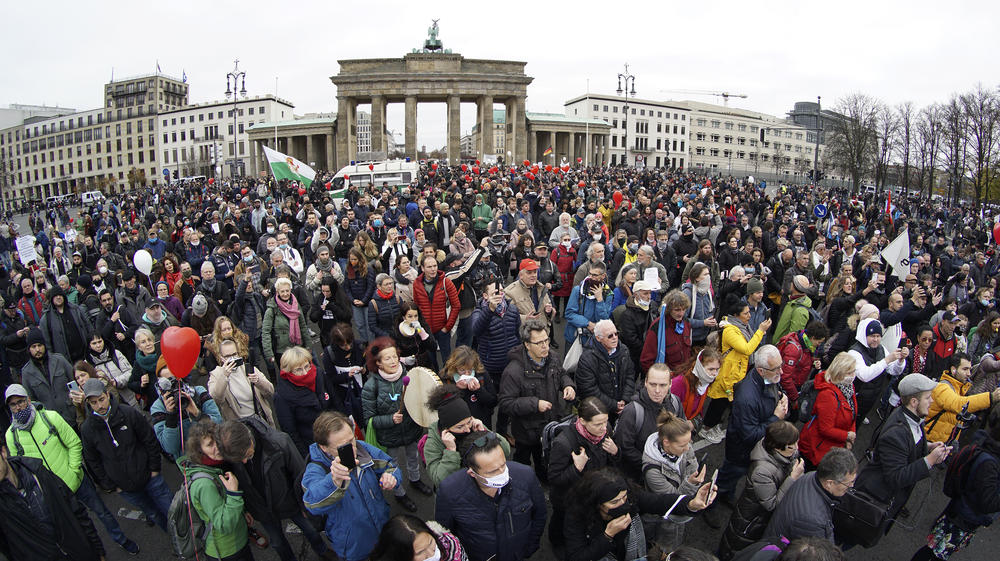 Crowds gather Wednesday in front of the Brandenburg Gate in Berlin to protest coronavirus restrictions in Germany.
