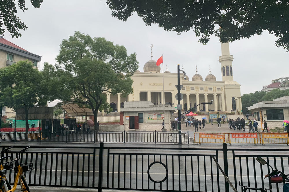 The main mosque in Yiwu, Zhejiang province. Nearby business owners say the local government removed the mosque's arched doorways but ran out of funds to remove the mosque domes.