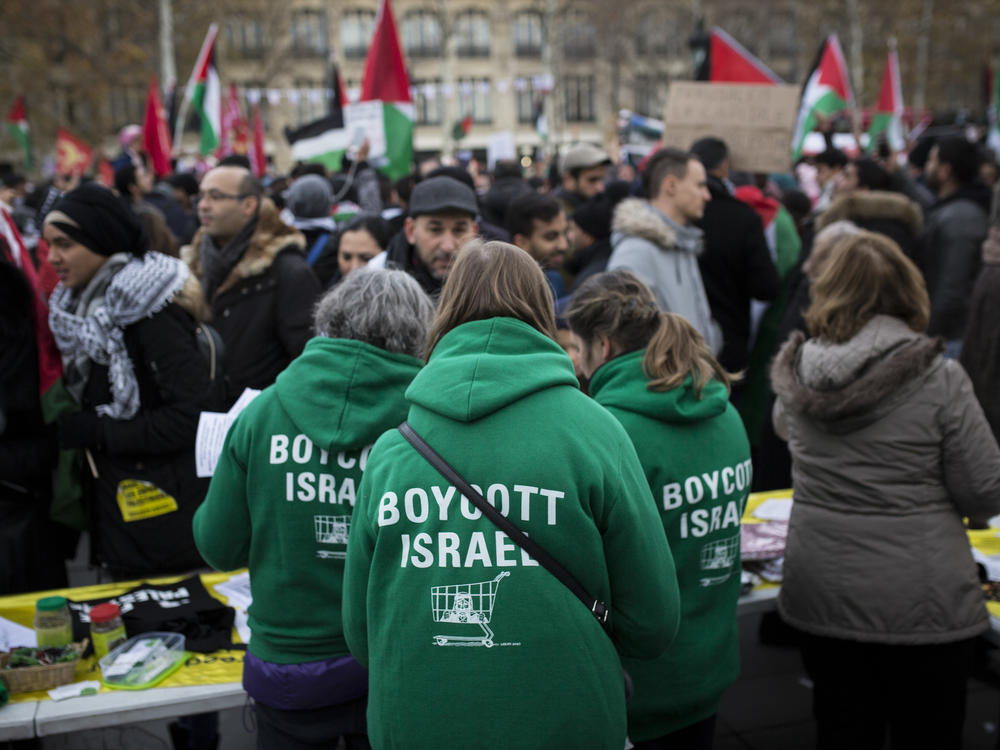 Demonstrators advocating the movement to boycott, divest from and sanction Israel, known as BDS, gather for a protest last year in Paris. On Thursday, U.S. Secretary of State Mike Pompeo announced a new policy specifically countering the global BDS campaign.
