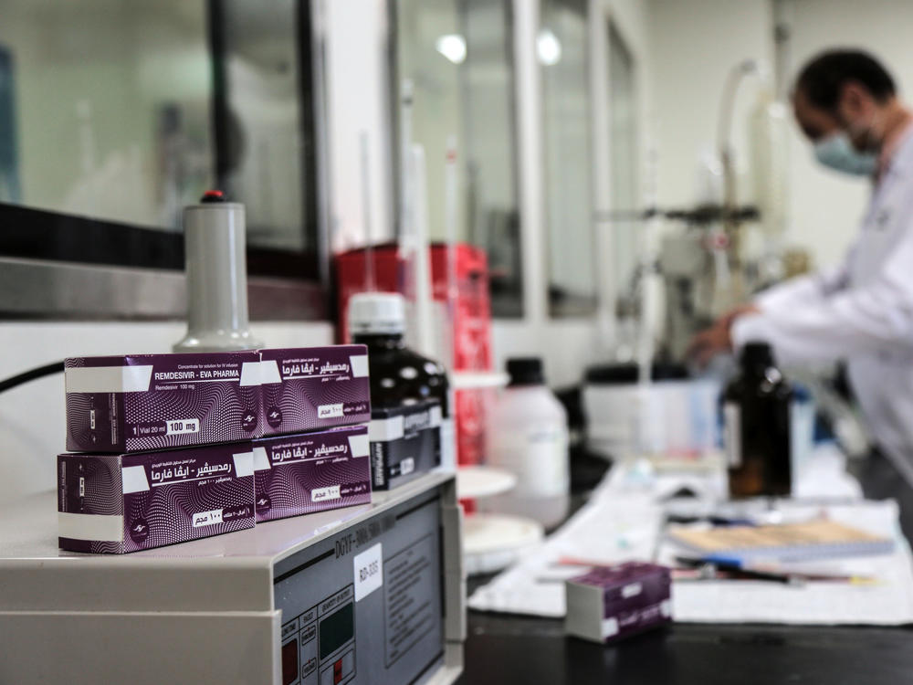 Boxes containing vials of remdesivir at a pharmaceutical company in Giza, Egypt.