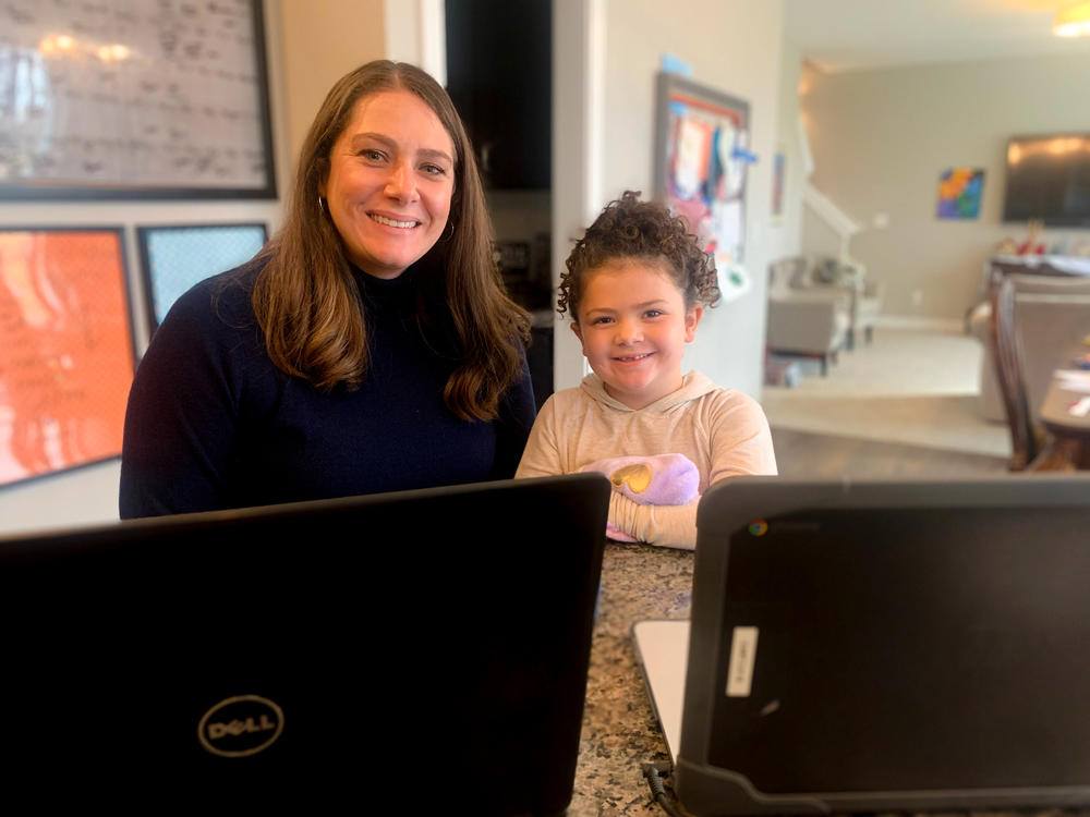 Annie Harrison at home with her 5-year-old daughter.